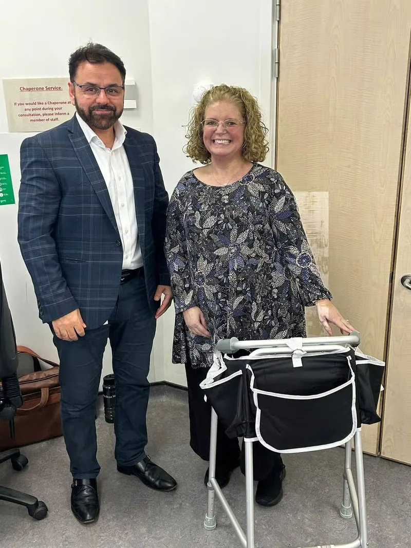 Helen with Mr Shakir Hussain after her complex total knee replacement at the Royal Orthopaedic Hospital Birmingham