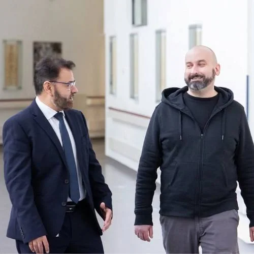 Mr Shakir Hussain with a patient following hip resurfacing surgery at the Royal Orthopaedic Hospital Birmingham