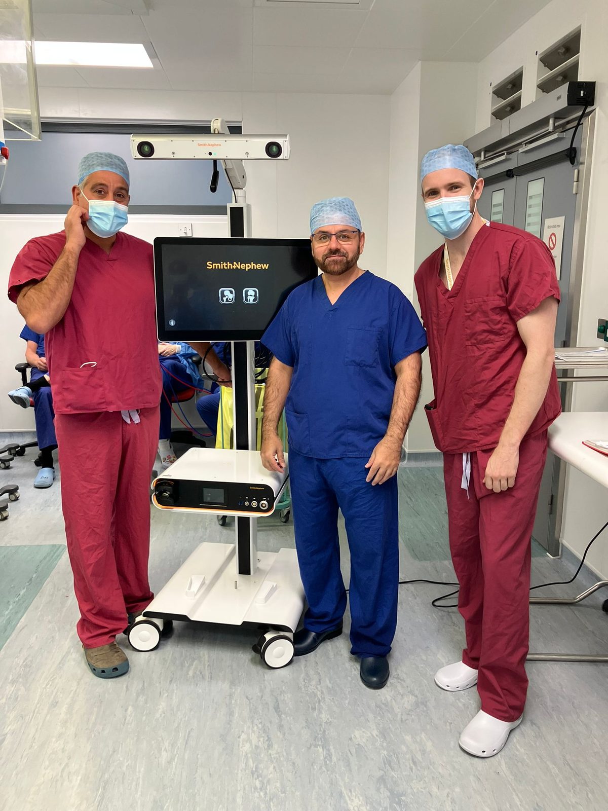 Robotic revision knee replacement in Birmingham: Mr Shakir Hussain with the Smith and Nephew CORI robotic team at the Royal Orthopaedic Hospital, where he performed the Midlands' first CORI robotic revision knee replacement